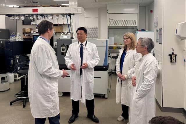 Professor Anthony Green (left), Alan Mak MP (centre, left), Professor Aline Miller (centre, right) and Dr Rosalind Le Feuvre (right) in one of the laboratories inside the Manchester Institute of Biotechnology
