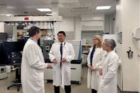 Professor Anthony Green (left), Alan Mak MP (centre, left), Professor Aline Miller (centre, right) and Dr Rosalind Le Feuvre (right) in one of the laboratories inside the Manchester Institute of Biotechnology