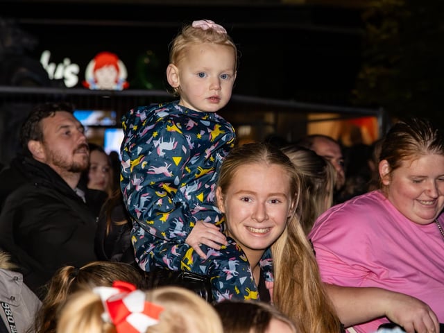 Hundreds of residents descended on Commercial Road to watch local dance troops and celebrities come together to turn on the Christmas lights.Pictured - Youngsters enjoying the entertainmentPhotos by Alex Shute