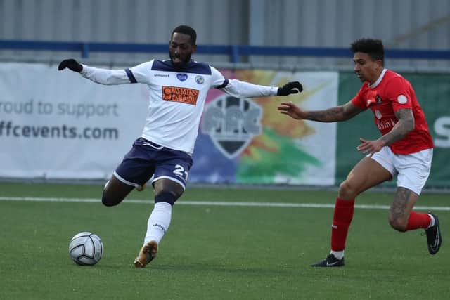 Roarie Deacon, left, in action for Hawks against Ebbsfleet last weekend in what turned out to be their 14th and last NL South game of the season. Photo by Dave Haines.