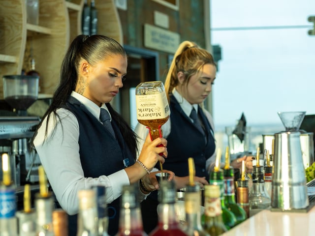 Bar staff preparing drinks for the Sky Bar's first guests.