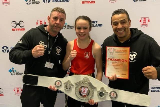 Holly Heffron (centre) and Heart of Portsmouth Academy head coach Q Shillingford MBE