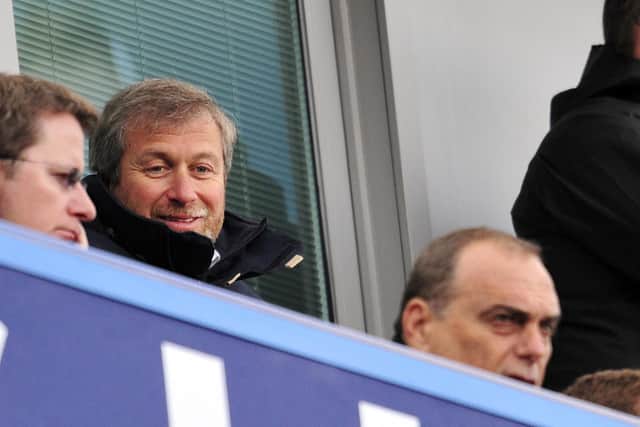 Roman Abramovich and his former Chelsea manager Avram Grant watch their FA Cup clash with Brentford in February 2013. Picture: GLYN KIRK/AFP via Getty Images