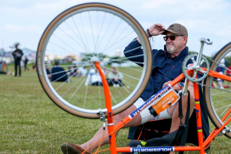 Robin Blair relaxes and watches the D-Day 80 national commemorative event from outside on the Southsea Common.Picture: Chris  Moorhouse (050624-054)
