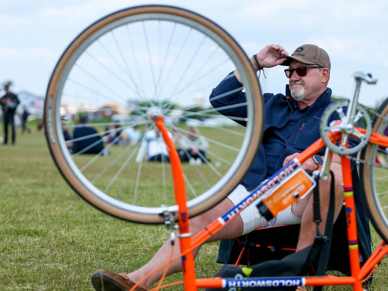 Robin Blair relaxes and watches the D-Day 80 national commemorative event from outside on the Southsea Common.Picture: Chris  Moorhouse (050624-054)