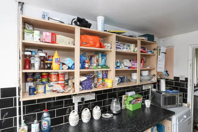 Her kitchen cupboards are missing doors making it unsafe to store items away from her children.
Picture: Stuart Martin (220421-7042)