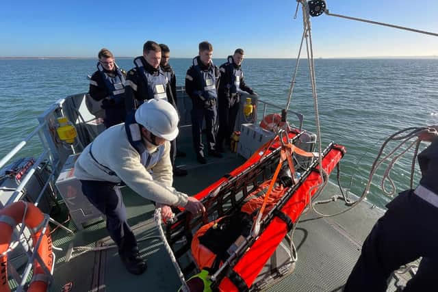 Sabre's crew demonstrate how a man overboard is recovered.