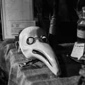 COVERING: If you think today's masks are limiting what about this? A plague mask in The Old Operating Theatre Museum and Herb Garret, London. Picture: Shutterstock