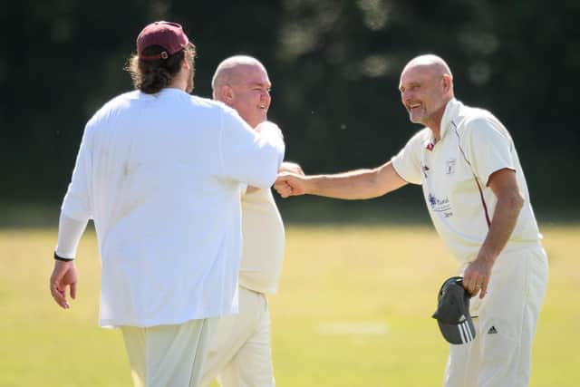 Portchester's Neal Hart celebrates his catch. Picture: Keith Woodland
