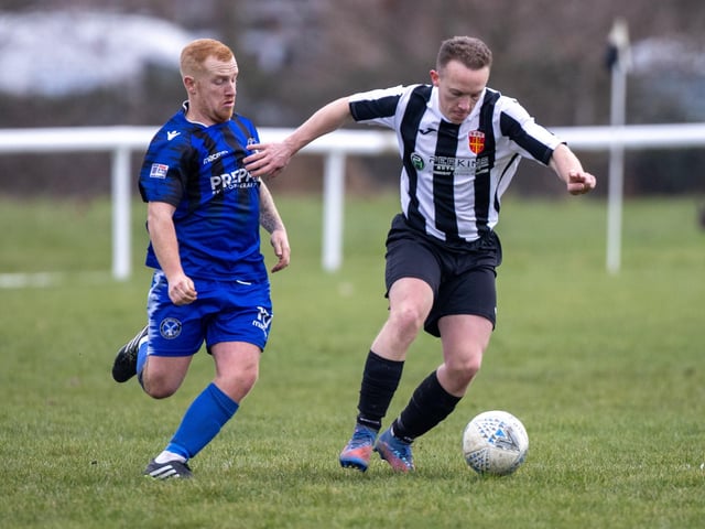 Hayling United (black/white) v Clanfield. Picture by Alex Shute