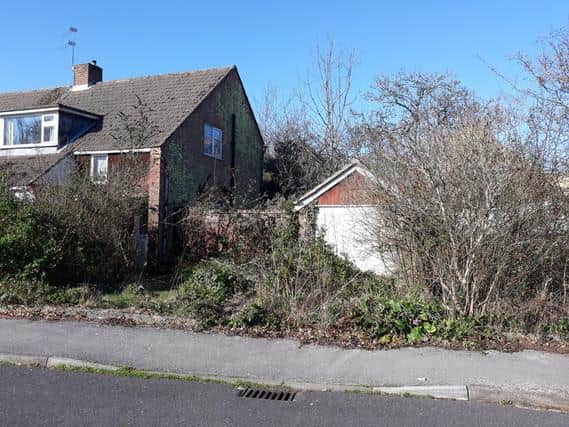 The house had been left to crumble, with its owner refusing to comply with a council order to fix it up.