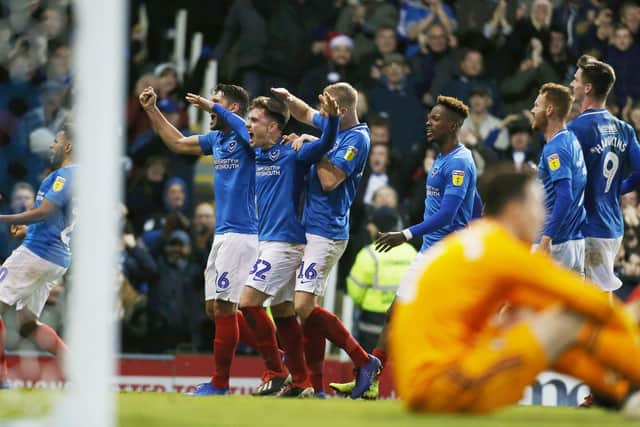 Ben Thompson (centre) celebrates scoring in the 3-1 triumph over Sunderland in December 2018 - his favourite Pompey match. Picture: Joe Pepler