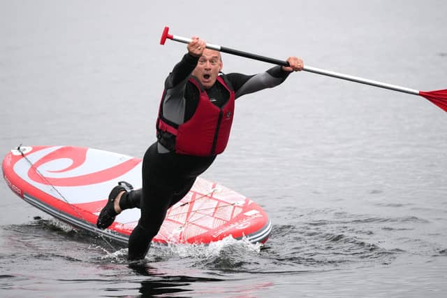 Lib Dem leader Sir Ed Davey falls into lake.