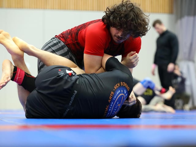David Ionita, top, competing in a Brazilian Jiu Jitsu competition at the Ravelin Centre in Portsmouth. Picture: Chris Moorhouse (jpns 250223-06)