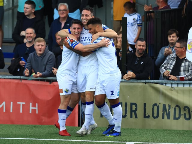 Jason Prior celebrates after scoring Hawks' opener with James Roberts, left, and Josh Passley. Picture by Dave Haines