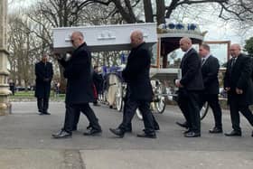 Ace Rewcastle's coffin is carried into St Mary's Church in Fratton today 
Picture: Sarah Standing