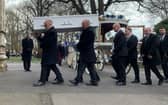 Ace Rewcastle's coffin is carried into St Mary's Church in Fratton today 
Picture: Sarah Standing