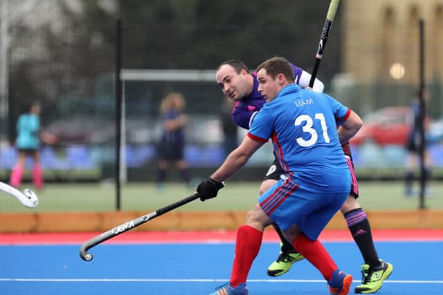 Portsmouth's Pete Wingate, left, and Liam O' Neil of US Portsmouth 2nds. Picture: Chris Moorhouse