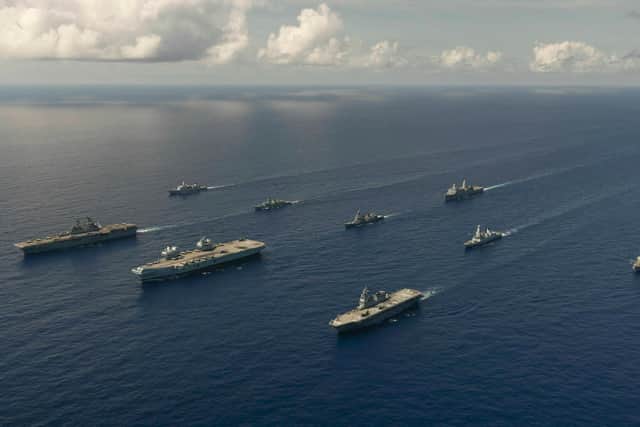 HMS Queen Elizabeth and her carrier strike group pictured on exercise with American and Japanese warships in the Pacific. Photo: Royal Navy