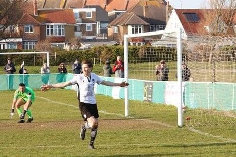 Evan Archibald celebrates one of his 29 goals for Bexhill last season. Picture by Joe Knight