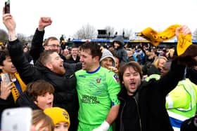 FA Cup magic - Ross Worner celebrates with fans after helping Sutton United dump Leeds United out of the tournament in 2016/17. Photo by Mike Hewitt/Getty Images.