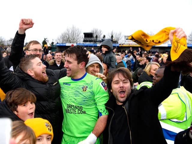 FA Cup magic - Ross Worner celebrates with fans after helping Sutton United dump Leeds United out of the tournament in 2016/17. Photo by Mike Hewitt/Getty Images.