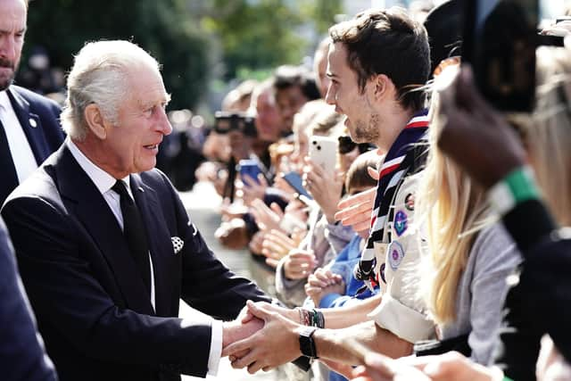 King Charles III meets members of the public in the queue along the South Bank, near to Lambeth Bridge, London, as they wait to view Queen Elizabeth II lying in state ahead of her funeral on Monday. Picture date: Saturday September 17, 2022. Picture: Aaron Chown/PA.