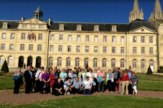 Portsmouth U3A group outside Caen Town Hall a couple of years ago.