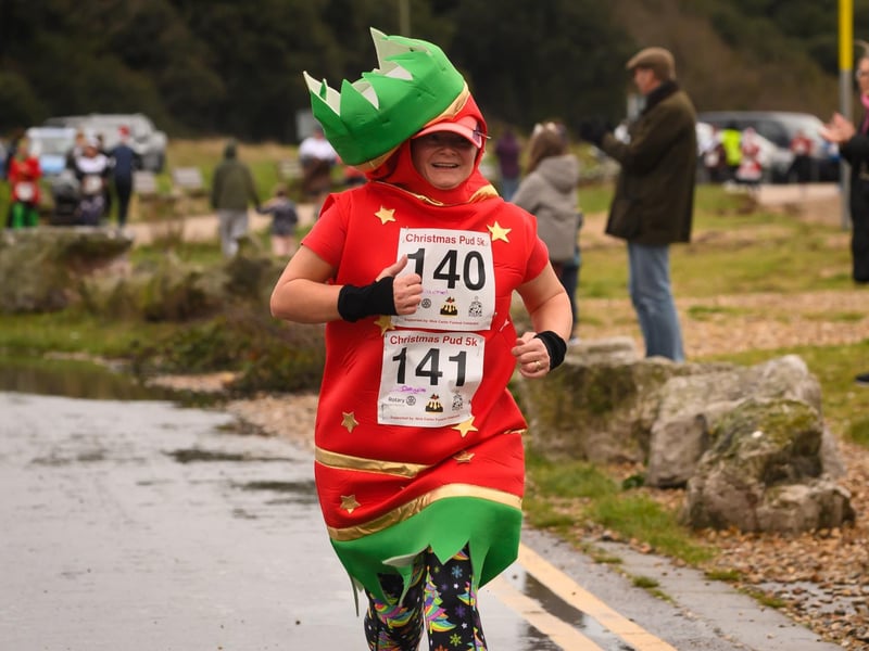 Rachael Morgan donned her Christmas cracker costume and ran with her husbands run number as well as he was unable to take part.