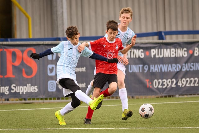 Action from the Portsmouth Youth League Geldard Invitation Cup final between Jubilee 77 U13s and Castle United U13s (light blue and white kit). Picture: Keith Woodland (190321-384)