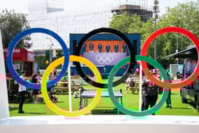 Fans watch the opening ceremony of the Tokyo 2020 Olympic Games on a big screen at the Team GB Tokyo 2020 Olympics fanzone, at Westfield, London Picture: Dominic Lipinski/PA Wire