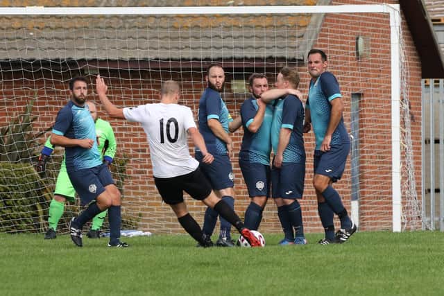 A Westleigh player takes a shot during their 6-3 Portsmouth Sunday League loss to Friends Fighting Cancer. Picture: Kevin Shipp
