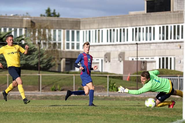US Portsmouth (blue/maroon) could find out today whether their Wessex League season has been null and voided for the second season running. Picture: Chris Moorhouse
