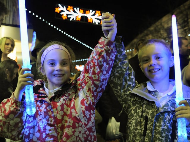 Rowan Hawkins (six) and Jack Hawkins (seven) from Eastney, enjoying the Christmas lights show in Commercial Road, Portsmouth in 2008.     Picture: Michael Scaddan (084638-0283)