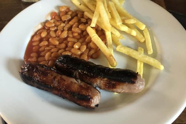 The children's sausage, chips and beans