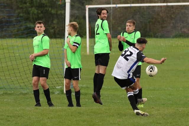 The Bedhampton wall tries to block a Fleur De Lys U23 free-kick. Picture: Kevin Shipp