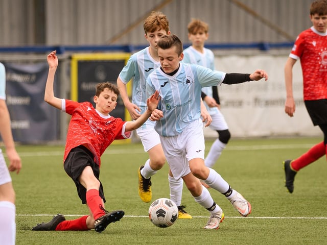 Action from the Portsmouth Youth League Geldard Invitation Cup final between Jubilee 77 U13s and Castle United U13s (light blue and white kit). Picture: Keith Woodland (190321-705)
