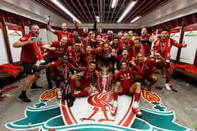 Liverpool celebrate their first top flight title since 1990. Photo by Andrew Powell/Liverpool FC via Getty Images.