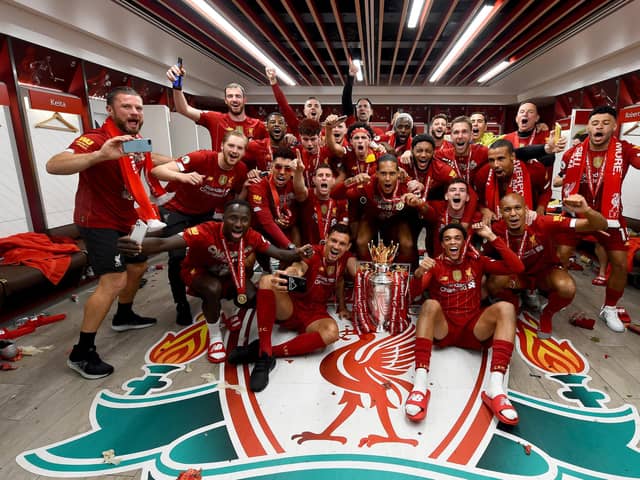 Liverpool celebrate their first top flight title since 1990. Photo by Andrew Powell/Liverpool FC via Getty Images.