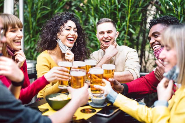 CHEERS:  Now let's learn to talk again. Picture: Shutterstock