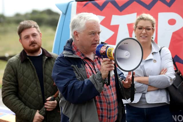'Dither and delay': Councillor Gerald Vernon-Jackson speaking out during a protest against Aquind. Pictured behind is Cllr Terry Norton and Penny Mordaunt, Portsmouth North MP. Picture: Sam Stephenson