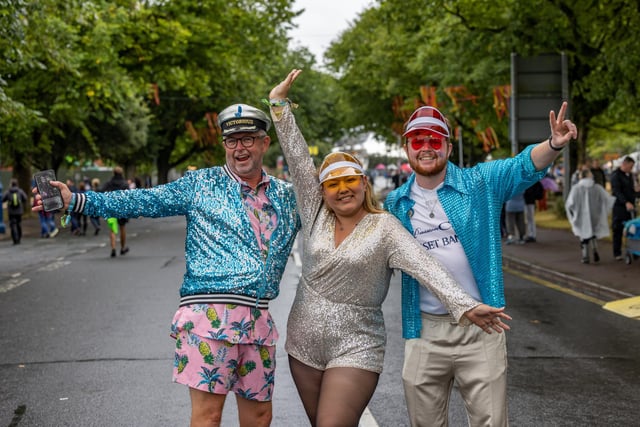 Mike Wheeler (58), Brigeth Encalada (24) and Ben Wheeler (25) from Oxford bringing some glitter to the gathering. Picture: Mike Cooter (240824)