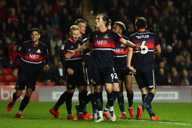 John Marquis celebrates scoring for Doncaster. Picture: Bryn Lennon/Getty Images