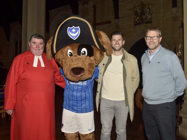 The News Carol Service was held at St Mary's Church in Fratton.  Pictured is: (l-r) Father Bob White, Nelson, Portsmouth FC head coach John Mousinho and publishing editor Mark Waldron.  Picture: Sarah Standing (061224-7343)