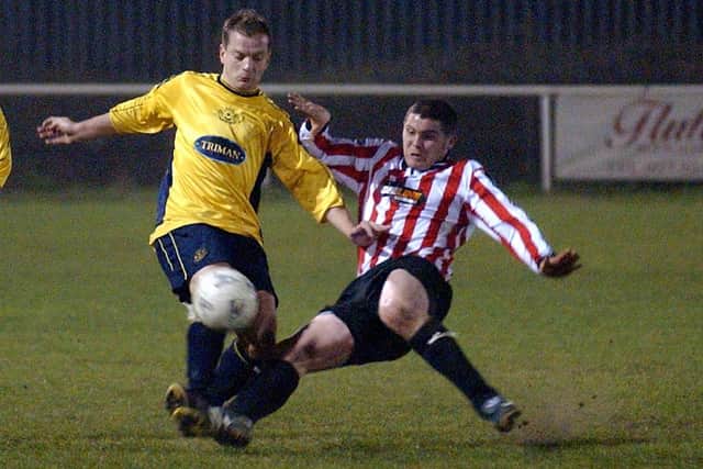 Lee Mould, left, in action for Moneyfields against Whitchurch. PICTURE: MICK YOUNG