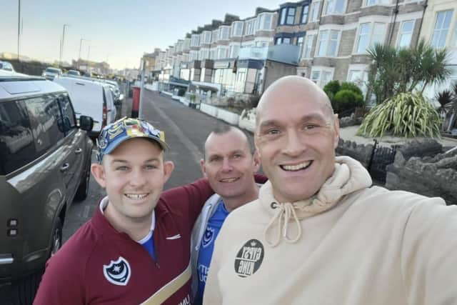 Tyson Fury poses for a selfie with Pompey fans Brendan Tuttiett and Richard Line before the Blues' game at Morecambe back in November.