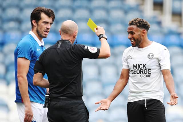 John Marquis and Nathan Thompson both got booked during Saturday's pre-season friendly at Fratton Park.