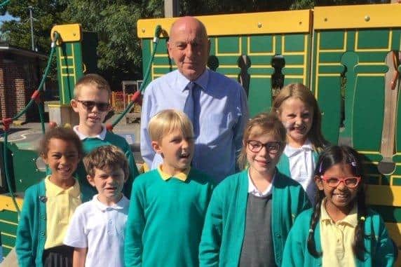 Head teacher, Howard Payne, with pupils, from left, Ariane Kamakoue, Liam Goble, Mickey Stanley, Max Butcher, Delia Dumitru, Maisie Clarke and Chanulya De Silva.