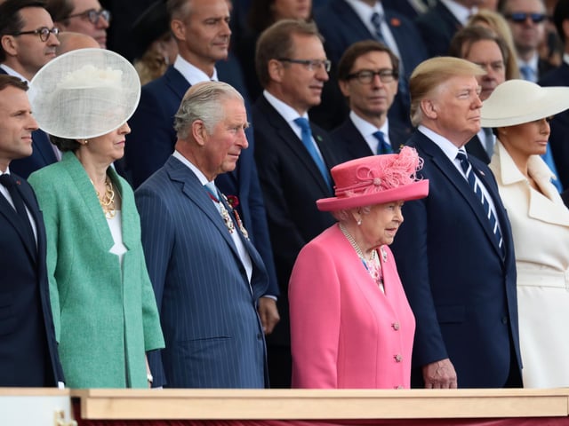 President of the United States, Donald Trump and First Lady of the United States, Melania Trump stand next to Theresa May, Prince Charles, Prince of Wales, Queen Elizabeth II
