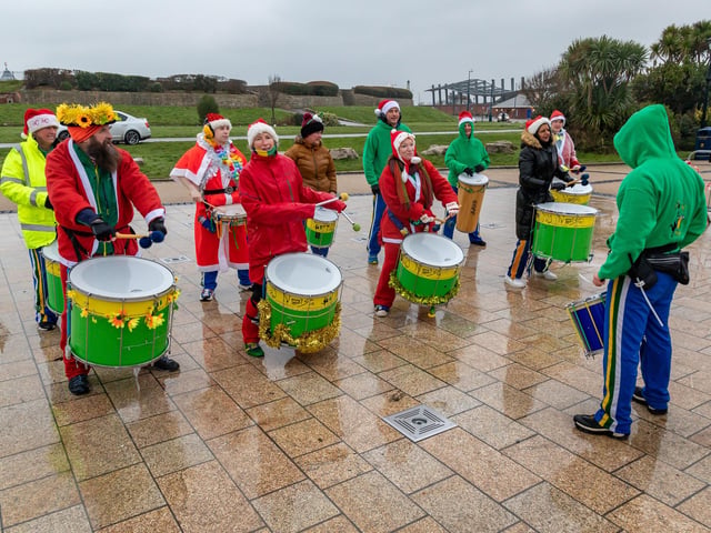 Big Noise Samba Band continued to provide a soundtrack despite the pouring rain